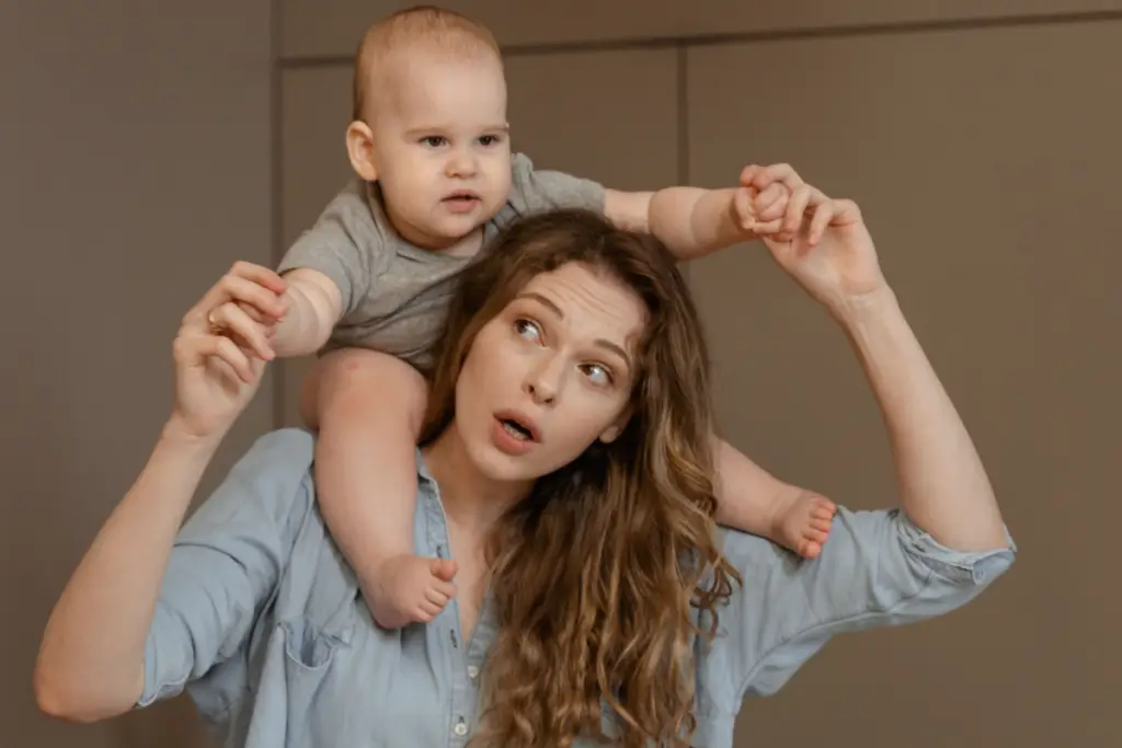 Mom with baby on shoulders, image for things I automated because I could not deal anymore