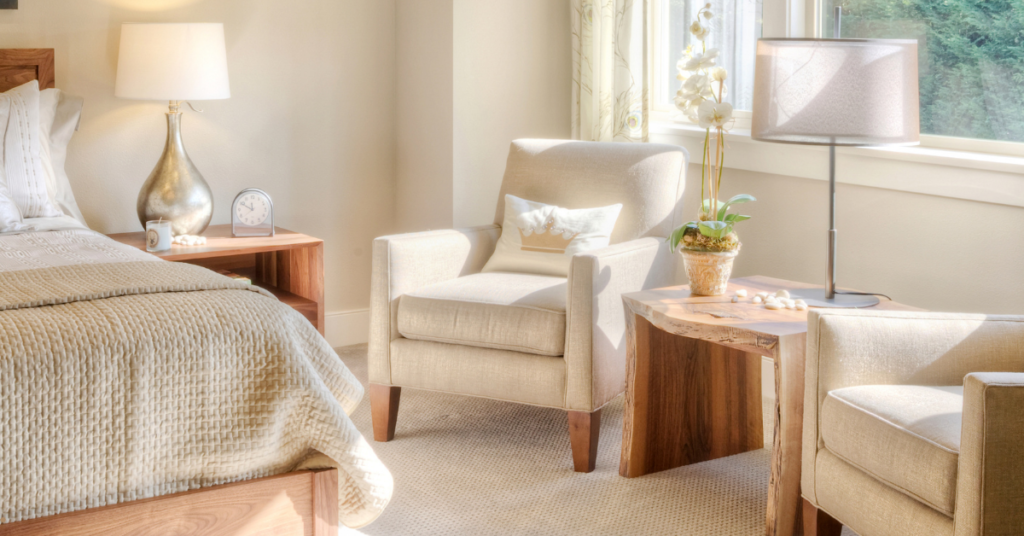 A calm, clutter-free bedroom illustrating the relief of a self-running laundry system.